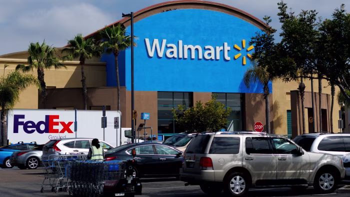 Walmart to shift listing to Nasdaq as retailer raises sales forecasts