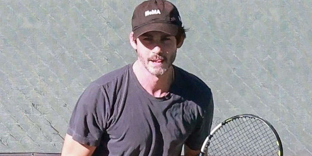 Logan Lerman Plays Tennis In the California Sunshine
