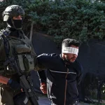 Week in Pictures: Syria salutes year of al-Assad fall, Sudan’s suffering